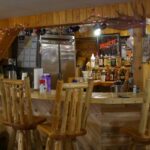 An inside view of a bird hunting lodge.