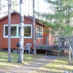 Exterior view of cabin with deck.