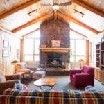 Interior view of lodge showing fireplace.